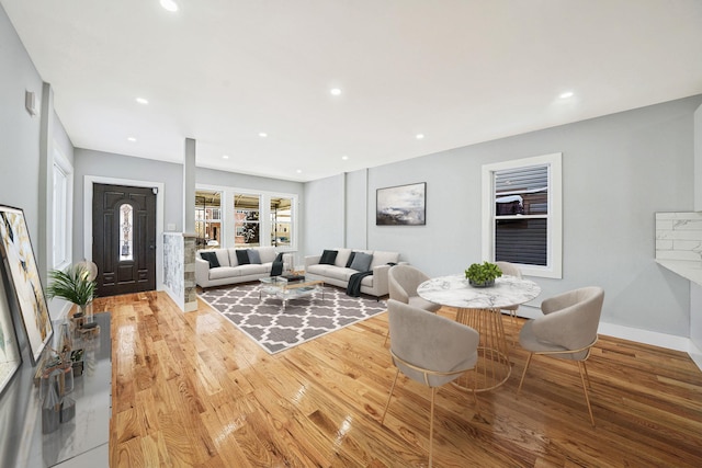 living room featuring light hardwood / wood-style flooring and a baseboard radiator