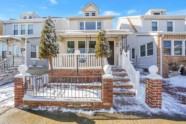 view of front of home featuring covered porch