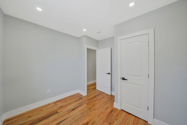 unfurnished bedroom featuring light hardwood / wood-style flooring