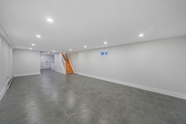 basement featuring a baseboard radiator