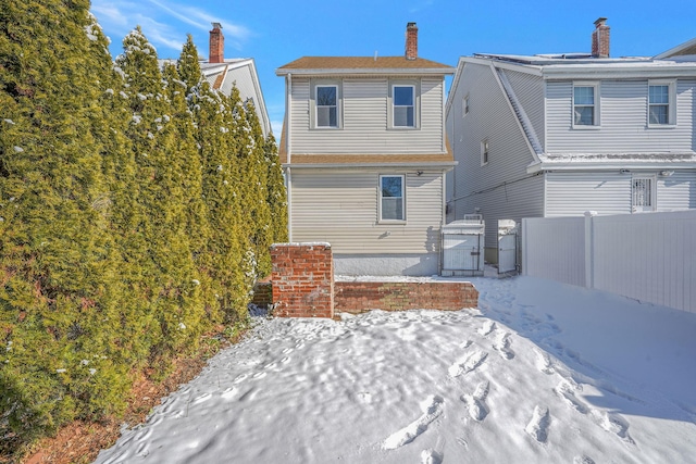 view of snow covered property