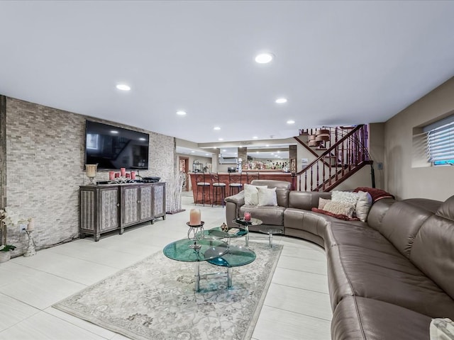 living room with light tile patterned floors and bar area