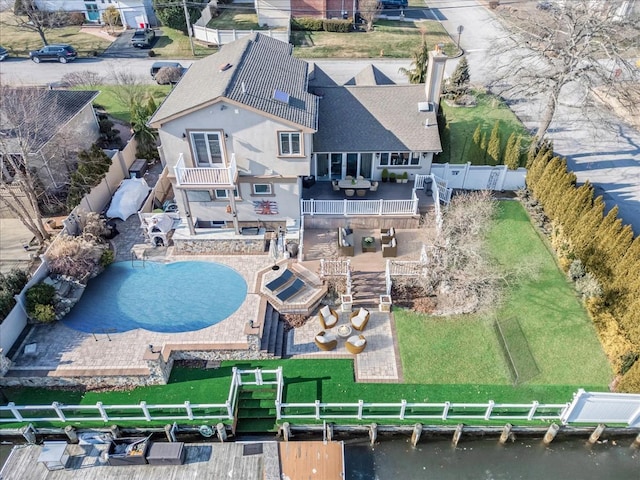 aerial view featuring a water view