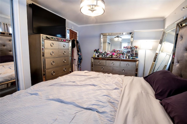 bedroom featuring bar and ornamental molding