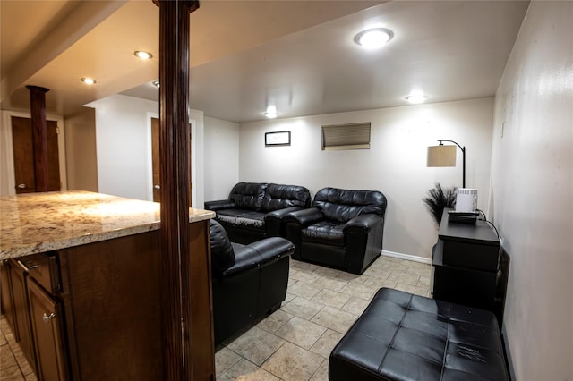 living room featuring decorative columns