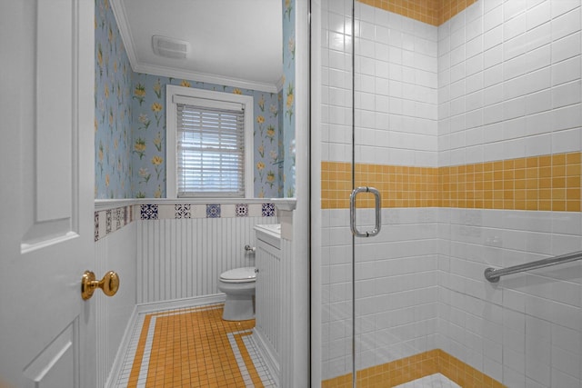 bathroom featuring toilet, tile patterned flooring, walk in shower, ornamental molding, and vanity