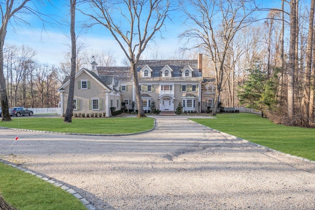 view of front of home with a front yard