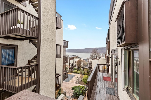 balcony featuring a water view