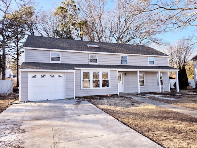 view of front property featuring a garage and covered porch