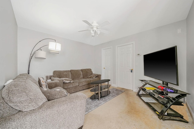 living room featuring ceiling fan