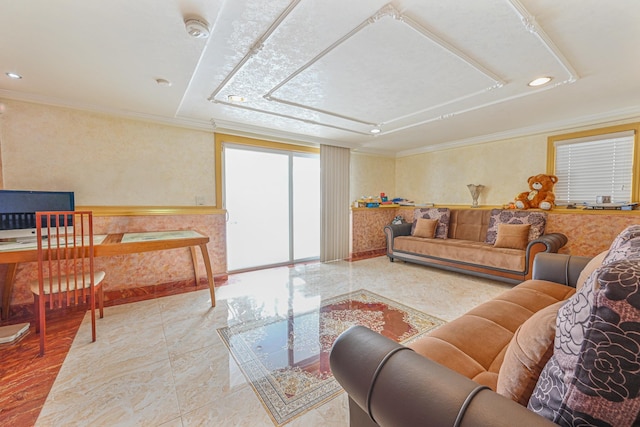 living room featuring crown molding