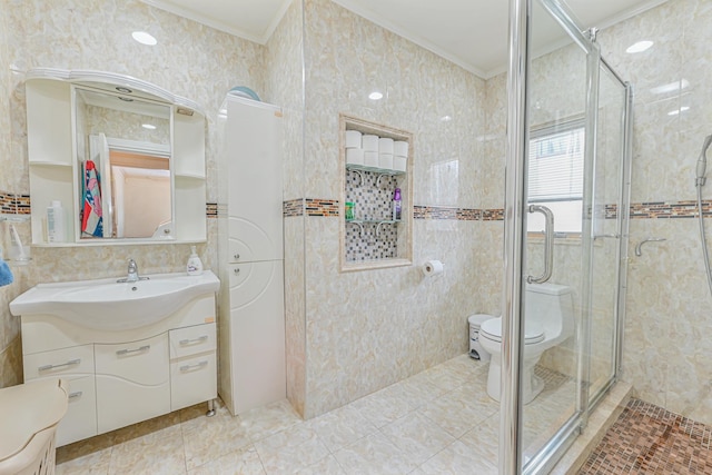 bathroom with ornamental molding, a shower with shower door, vanity, and toilet