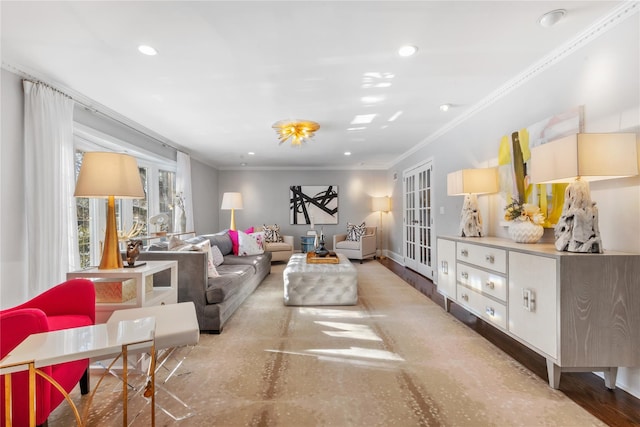 living room featuring ornamental molding, recessed lighting, and baseboards