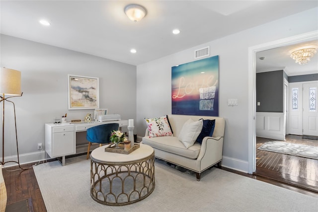 living room with recessed lighting, visible vents, a notable chandelier, and hardwood / wood-style floors