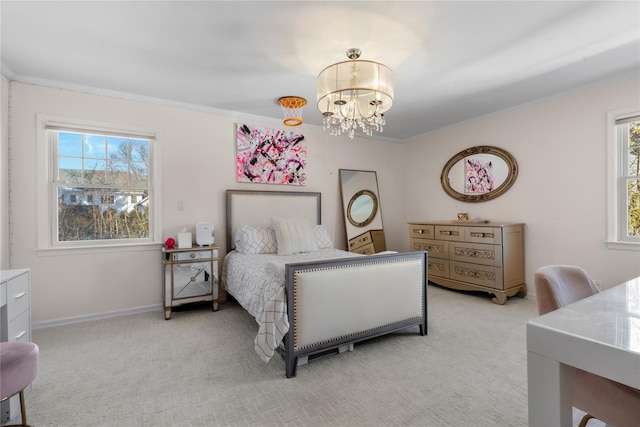 bedroom with a chandelier, ornamental molding, baseboards, and light colored carpet