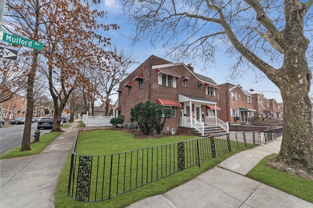 view of front of property with a front lawn