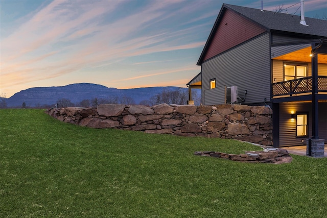 exterior space featuring central AC unit and a mountain view