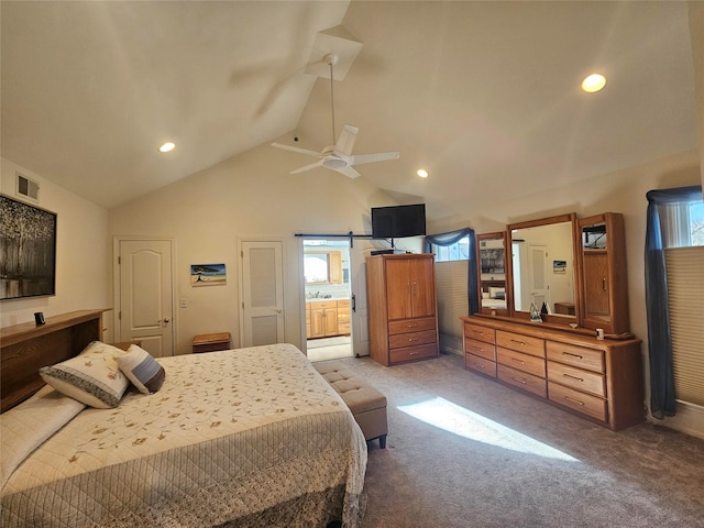 carpeted bedroom featuring ensuite bathroom, high vaulted ceiling, and ceiling fan