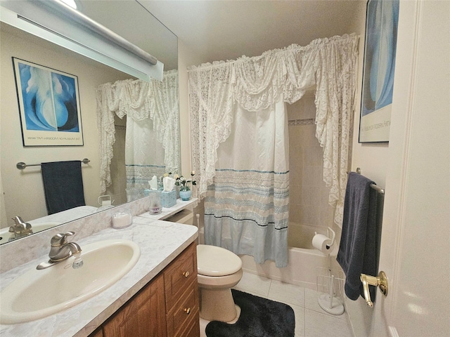 full bathroom with shower / bath combo, vanity, tile patterned floors, and toilet