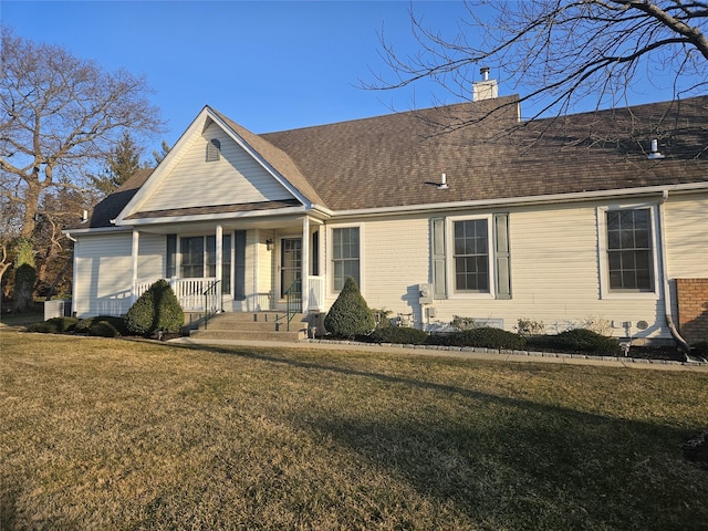 view of front of house featuring a porch and a front yard