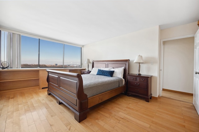 bedroom with light hardwood / wood-style flooring