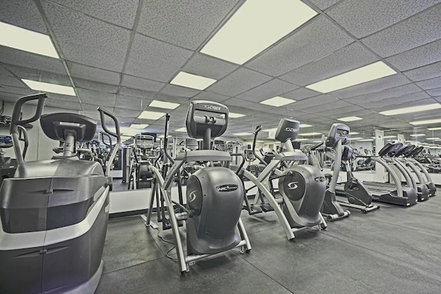 workout area featuring a paneled ceiling