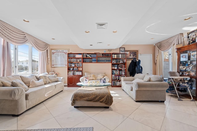 138-65 63rd Ave, Flushing, NY 11367 - living room featuring healthy amount of natural light, light tile patterned floors, and recessed lighting