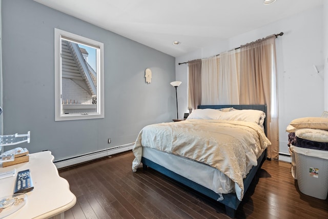 138-65 63rd Ave, Flushing, NY 11367 - bedroom featuring a baseboard radiator, wood-type flooring, and recessed lighting