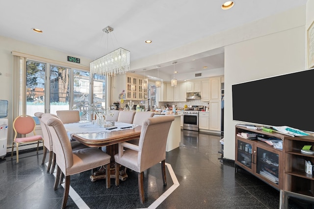 138-65 63rd Ave, Flushing, NY 11367 - dining space featuring a chandelier, recessed lighting, and a baseboard radiator