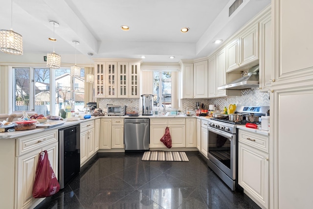 138-65 63rd Ave, Flushing, NY 11367 - kitchen with appliances with stainless steel finishes, under cabinet range hood, granite tiled floors, light countertops, and recessed lighting