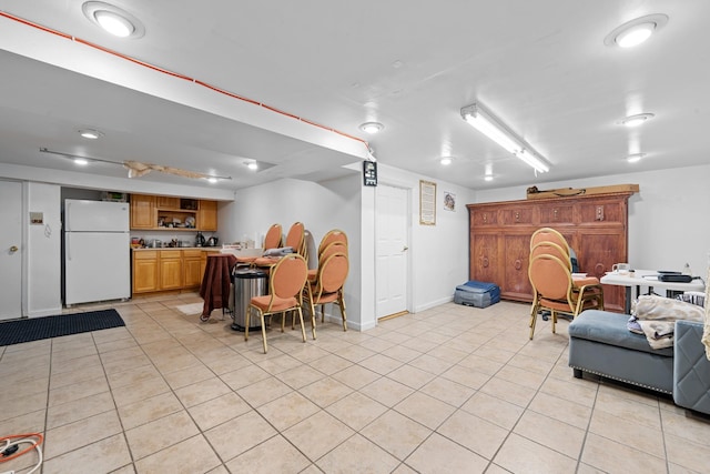 138-65 63rd Ave, Flushing, NY 11367 - interior space featuring light tile patterned floors, wet bar, and baseboards