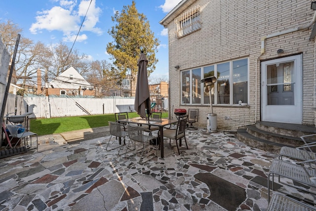 138-65 63rd Ave, Flushing, NY 11367 - view of patio featuring entry steps, a fenced backyard, and outdoor dining area