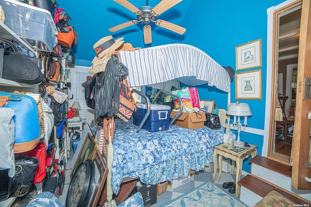 bedroom featuring ceiling fan and hardwood / wood-style flooring