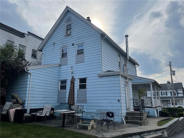 rear view of house featuring a patio area