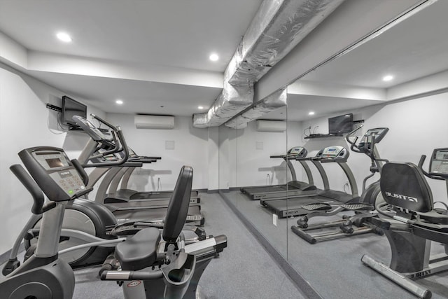 exercise room with a wall unit AC