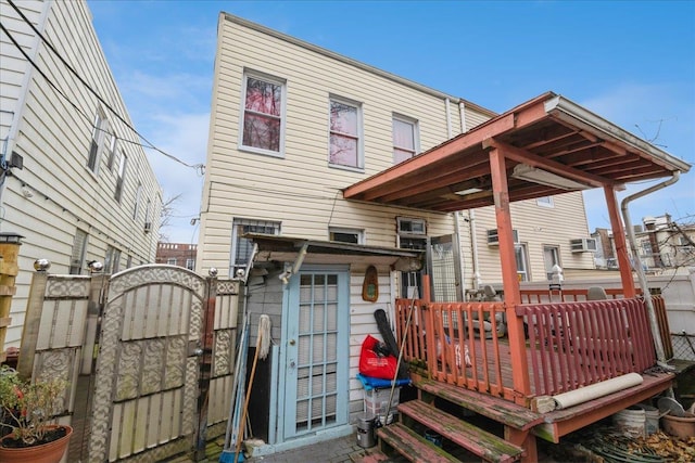 rear view of property with a deck