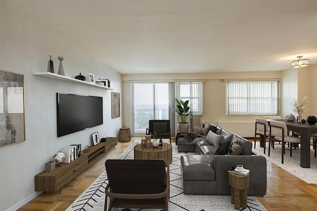 living room featuring parquet floors