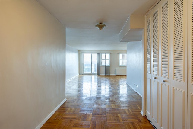 hall with dark parquet floors