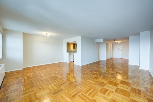 unfurnished living room featuring light parquet floors