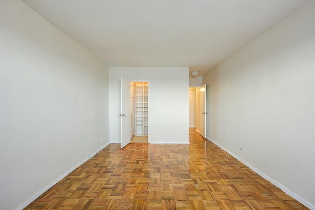 spare room featuring light parquet floors