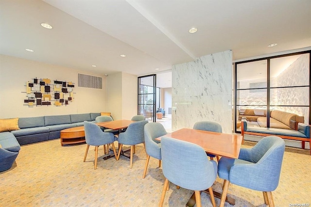 dining room featuring expansive windows