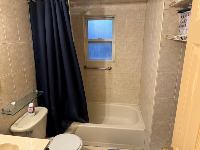 full bathroom featuring vanity, tile walls, toilet, and shower / bath combo with shower curtain