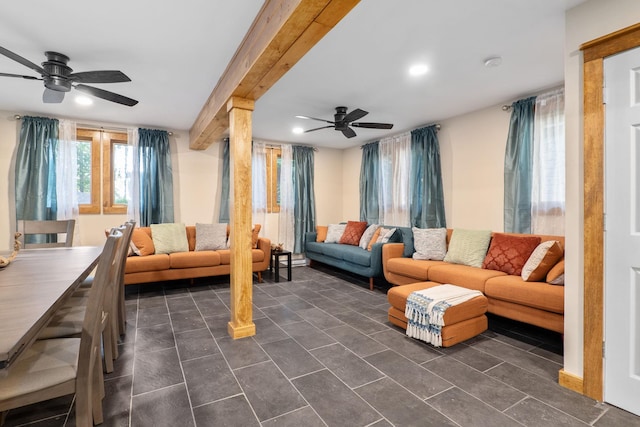 interior space with ceiling fan