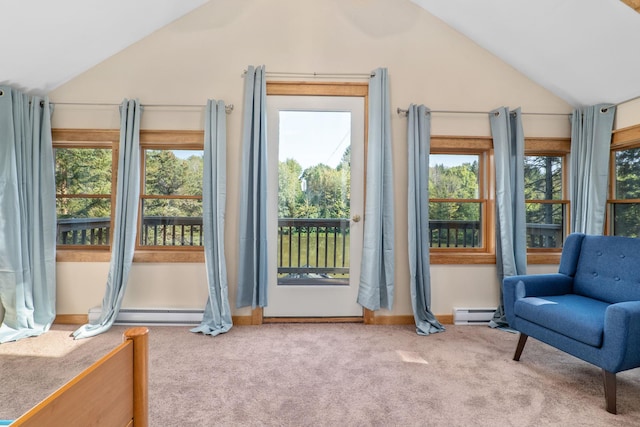 interior space featuring carpet, vaulted ceiling, plenty of natural light, and a baseboard radiator