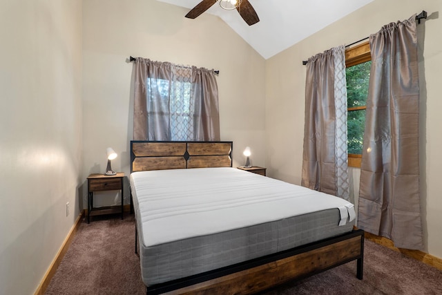 carpeted bedroom with ceiling fan and lofted ceiling