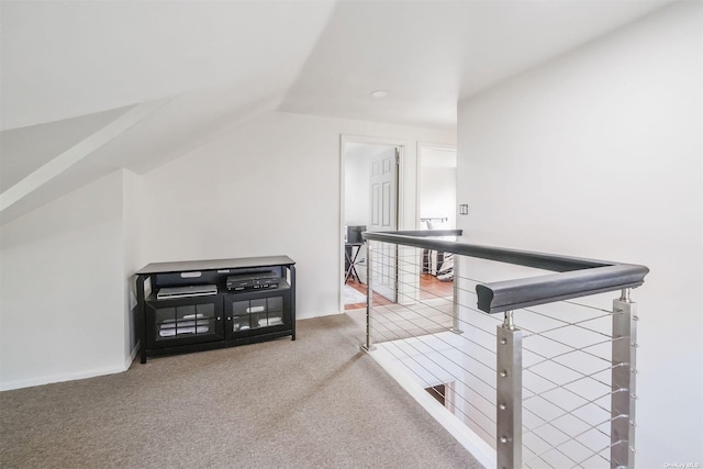 bonus room with carpet flooring and lofted ceiling