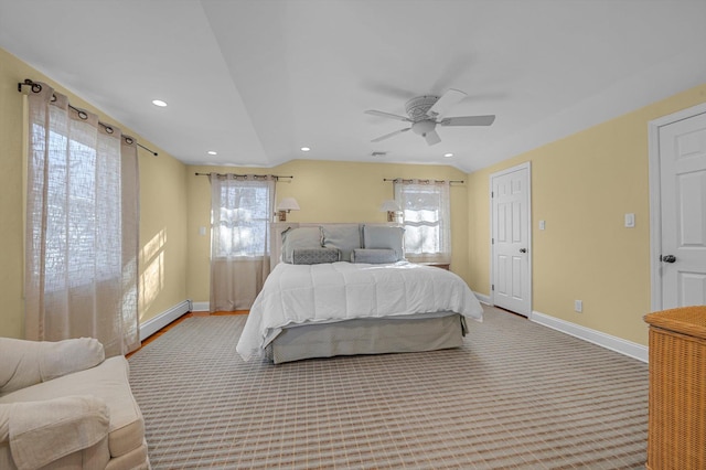 bedroom with multiple windows, vaulted ceiling, and ceiling fan