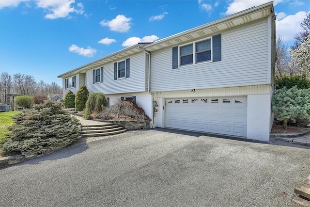 bi-level home with a garage