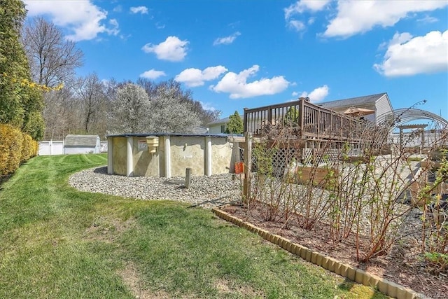 view of yard with a deck