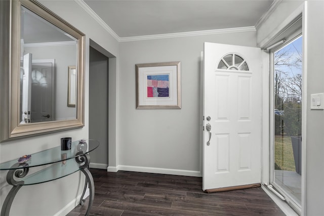 foyer with dark wood-type flooring and ornamental molding